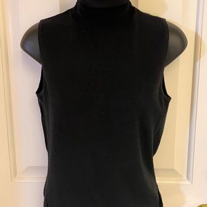 Easel black no sleeve turtleneck.